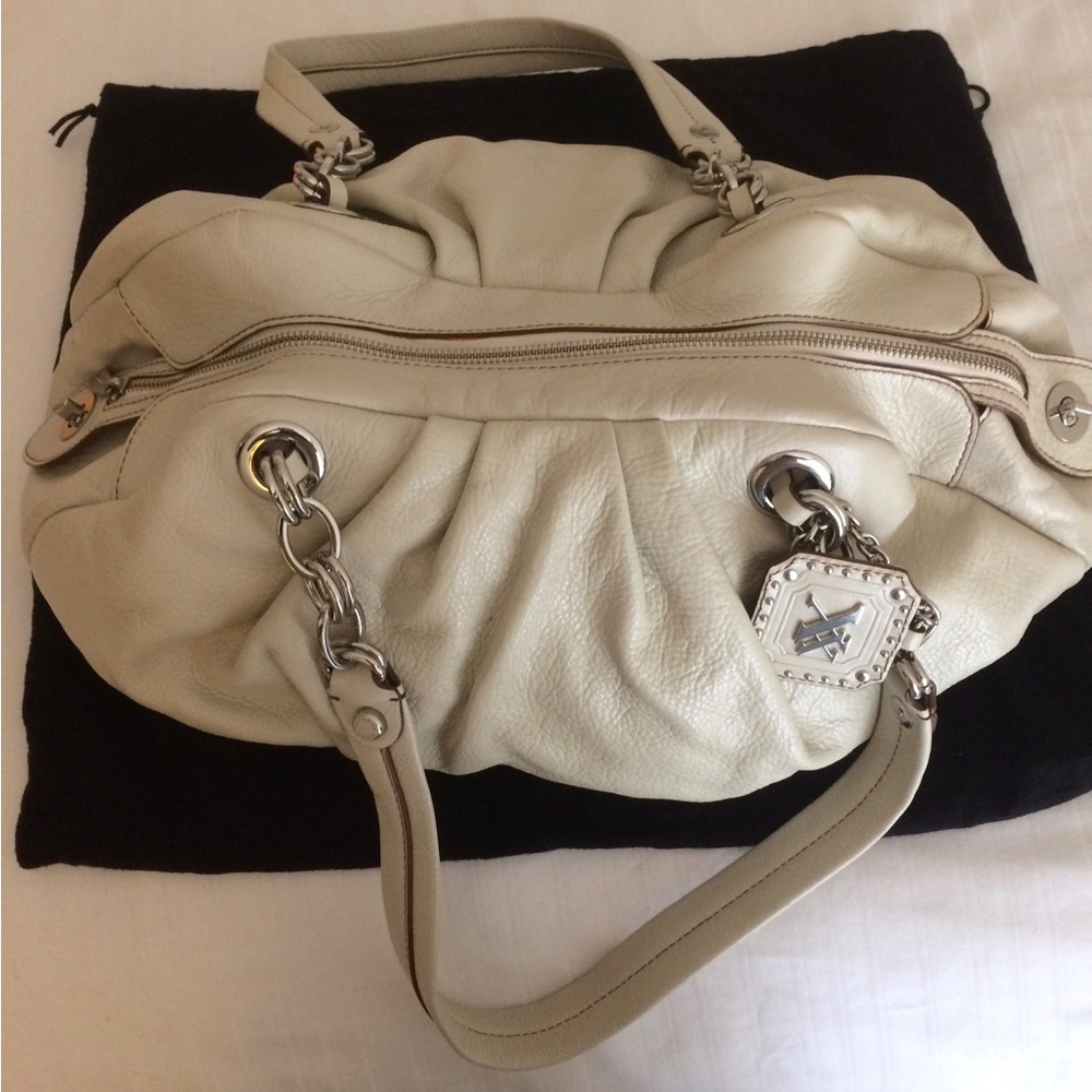 White leather bag.